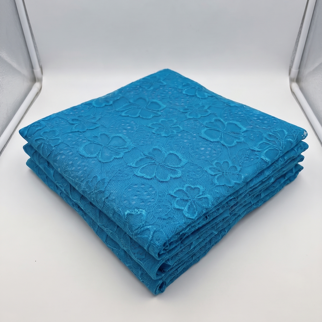 Turquoise Floral Stretch Lace Fabric