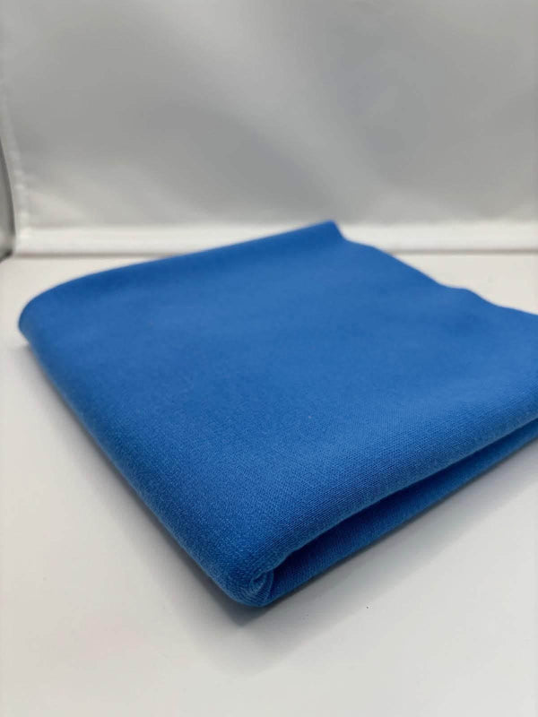 French Blue ponte roma fabric folded