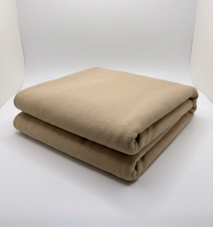 Stone 100% Cotton Loopback Jersey Fabric folded