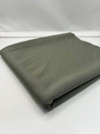 Khaki Green ponte roma fabric folded