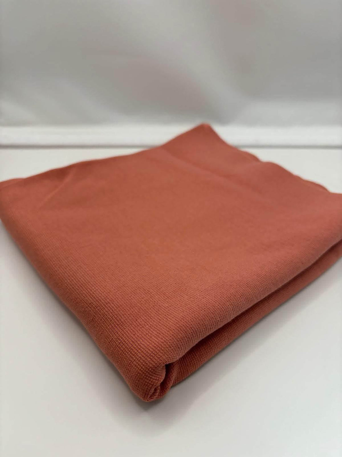 Terracotta ponte roma fabric folded