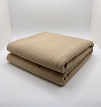 Stone 100% Cotton Loopback Jersey Fabric folded